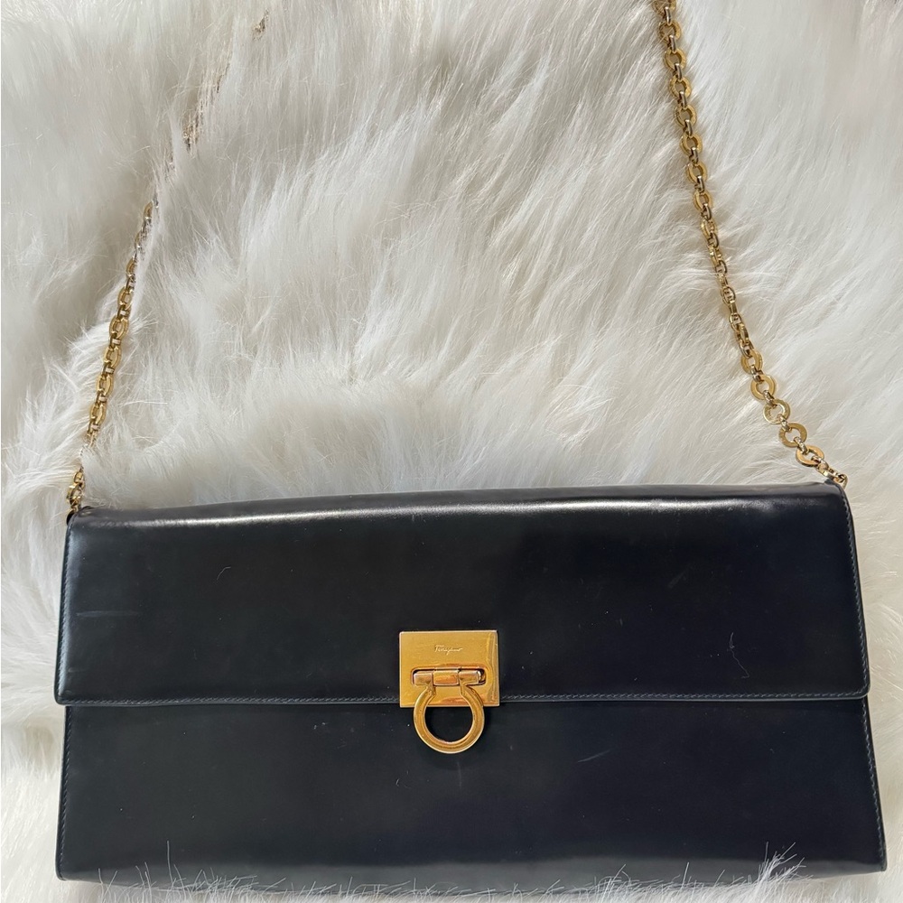 SOLD‼️Salvatore Ferragamo Black Leather Clutch with Gold Chai